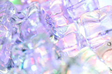 Colorful Iridescent Ice Cubes with Shimmering Reflections – Close-Up of Frozen Crystal Structures...