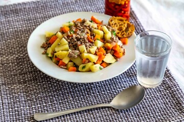 Traditional Brazilian rustic food, flesh with potatoes and carrots