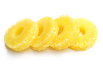 Juicy pineapple rings on white background.