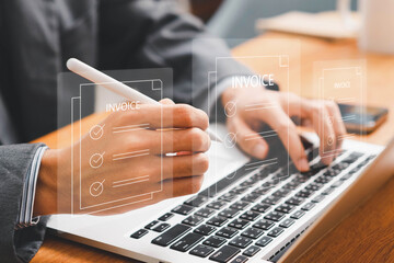 E-Invoice and Digital billing concept, Invoice, Businessman using laptop to manage electronic statements virtual screen. E-tax, Digital receipt, Online invoice processing and tax accounting solutions.