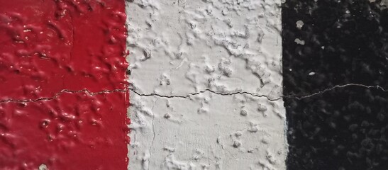 Rough Textured Wall with Red White Black Stripes