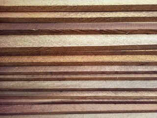 Stacked Wooden Planks Displaying Natural Grain Texture