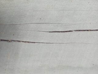 Subtle Cracked Wood Surface with Faint Gray Paint