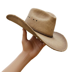 Hand holding worn-out cowboy hat against black backdrop