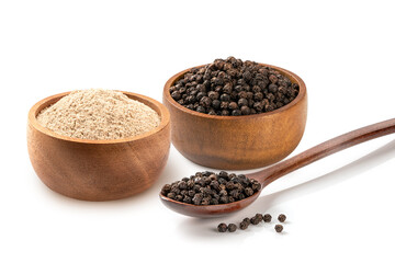 Black pepper and ground black pepper in a wooden bowl  and spoon isolated on white background.