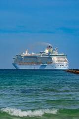 Cruise ship on the ocean. Luxury liner at sea. Miami Beach with cruise ship. Turquoise water and...