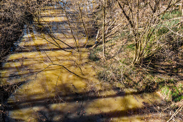 Rise of water level in a ravine due to snow melting in spring