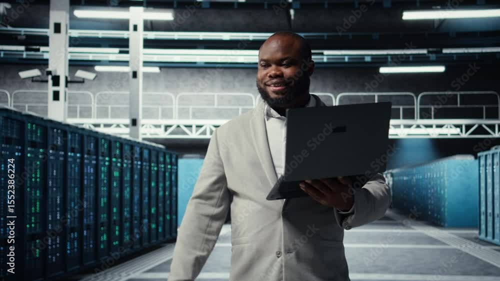 Poster server room worker auditing systems for vulnerabilities using software on laptop. engineer walking i