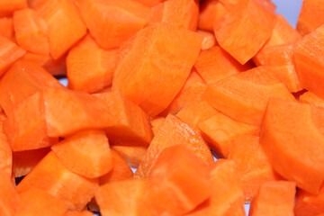 Chopped Carrot. Prepared Orange Vegetable. Ready-to-Eat Carrot pieces. Chopped carrot, ready for consumption.