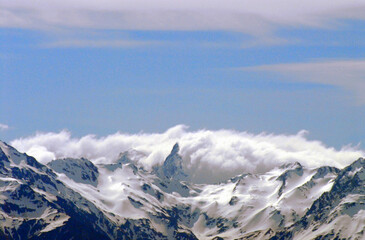 Alaska- Snow Capped  Cloud Covered Peaks in Denali National Park