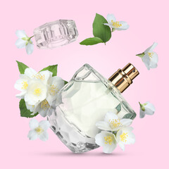 Bottle of floral perfume and jasmine flowers in air on pink background