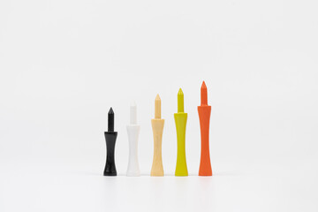 Colorful Wooden Golf Tees Standing on White Background – Product Display
