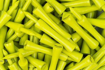 Close-Up of Bright Yellow Golf Tees – 50mm Wooden Tees
