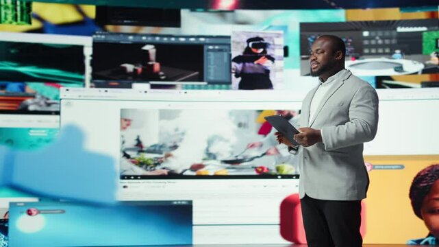 Joyous man using tablet, receiving personalized video recommendations delivered instantly. Upbeat user using device, enjoying digital era enabling unlimited streaming opportunities, camera A