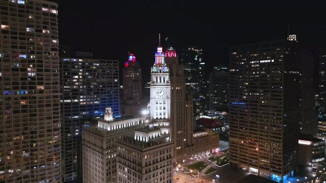 Aerial of Clocktower and Chicago Skyline at Night
