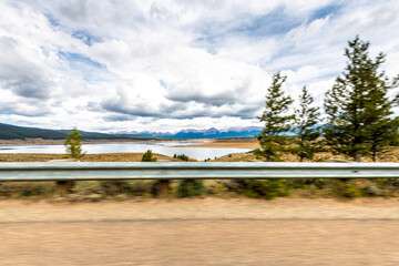 Taylor park river reservoir lake in Cottonwood pass, Colorado vehicle car driving in autumn valley...