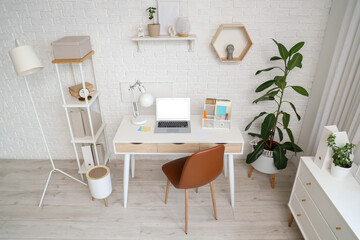 Interior of stylish office with modern workplace