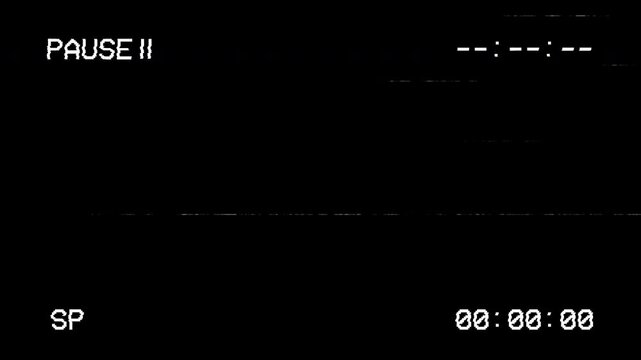 looping animation VHS video tape pause screen on black background. 4K Video