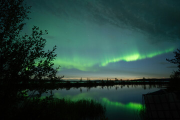 Aurora borealis Northern Lights fully covered the sky. Lapland amazing scenery