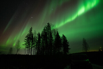 Aurora borealis Northern Lights fully covered the sky. Lapland amazing scenery