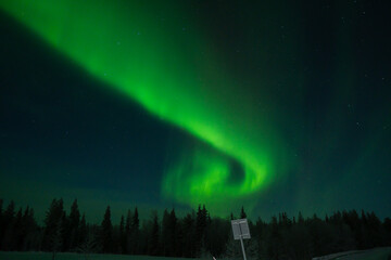 Aurora borealis Northern Lights fully covered the sky. Lapland amazing scenery