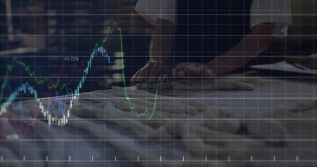 Woman baker kneading dough causing animated finance graphs climbing and dipping above worktable - Powered by Adobe