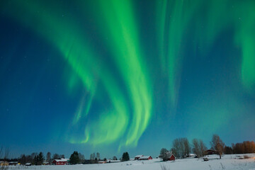 Aurora borealis Northern Lights fully covered the sky. Lapland amazing scenery