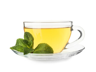 Glass cup of hot mint tea on white background