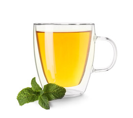 Glass cup of hot mint tea on white background