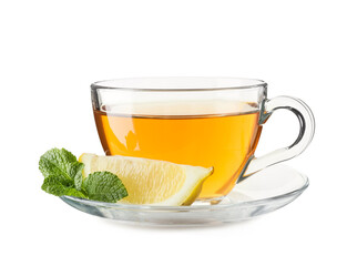 Glass cup of hot mint tea with piece of lemon on white background