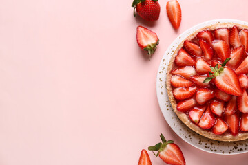 Plate with sweet strawberry tart and fresh berries on pink background