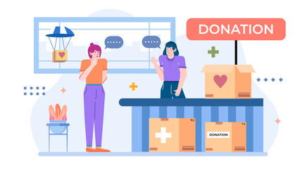 Two women donating boxes at a charitable donation center. Suitable for illustrating charity, generosity, giving back, community support concepts.