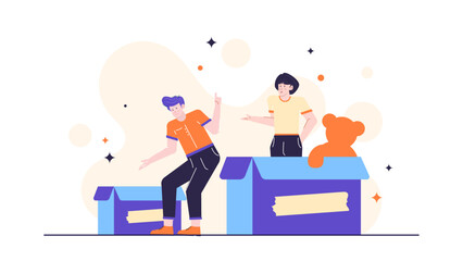 Two people pack a teddy bear into boxes for donation. Suitable for charity, volunteering, donation, kindness, generosity, community support concepts.