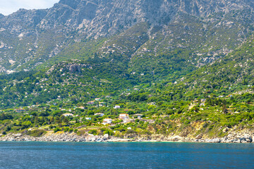 Magganitis fishing village townscape on Ikaria island, Greece longevity blue zone by Greek Icarian sea ocean water