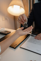 staff is explaining the information about the house lease contract documents to the buyer, the...