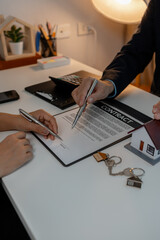 staff is explaining the information about the house lease contract documents to the buyer, the...