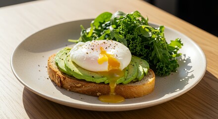 Sunlit Avocado Toast with Poached Egg and Greens: A Delicious Start to Your Day