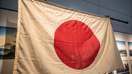 Aged Japanese Flag Displayed in Museum Setting, Historical Artifact