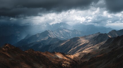 A Vast Mountain Range With Dramatic Clouds