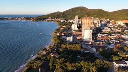 First light touches the ocean as the day begins — golden skies, calm seas, and nature in perfect...