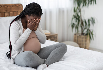 Sad Black Pregnant Woman Crying At Home, Having Maternity Depression, Suffering Hormonal Changes...