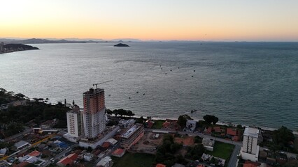 First light touches the ocean as the day begins — golden skies, calm seas, and nature in perfect...