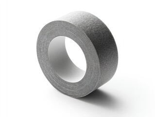 A roll of dark gray adhesive tape sits on a white background, casting a subtle shadow, showcasing its textured surface and cylindrical form