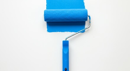 Blue paint roller on white surface