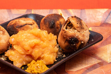 Traditional Indian Bihari Dish Litti Chokha Served on a Plate – Popular Spicy and Healthy Village-Style Food