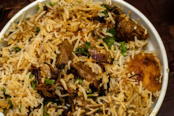 Delicious Vegan Biryani Made with Tender Jackfruit in a Bowl – Concept of Plant-Based Indian...