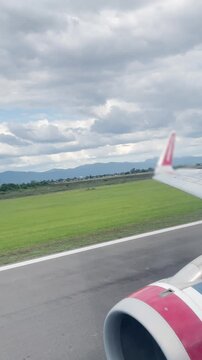 Aircraft Taking Off, Turbine and Wing Seen From Window Seat - 4K Vertical