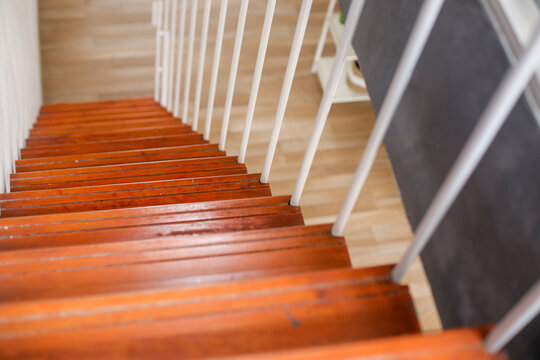 Top View Of Wooden Staircase In House Interior - Powered by Adobe