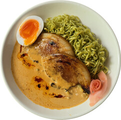 “Green Ramen Noodles in Creamy Broth with Pork and Soft-Boiled Egg”