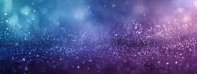 Obraz premium An abstract image of glittering particles transitioning from cool blues to warm purples, creating a dreamy, bokeh-filled effect